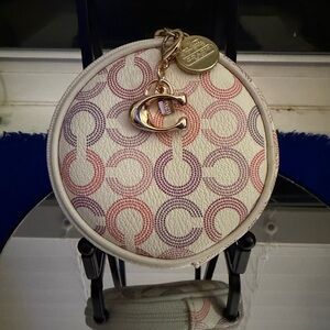 AUTHENTIC Coach Circular Coin Pouch. A Coach mini charm added.